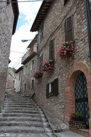 Casa con corte esterna e terrazzo