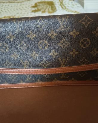 pochette Vuitton Dame originale.