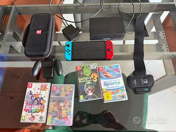 Nintendo Switch OLED 64GB + 4 giochi e accessori