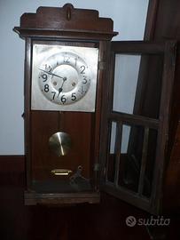 Orologio pendola a muro