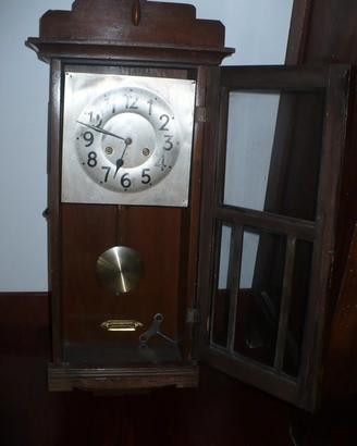 Orologio pendola a muro