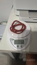 Collane corallo e oro