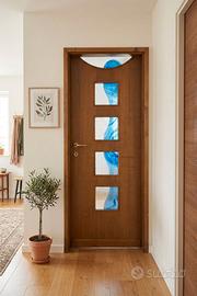 10 Porte interne in legno massello in vetrata