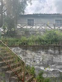 Casetta panoramica con terreno a Milo
