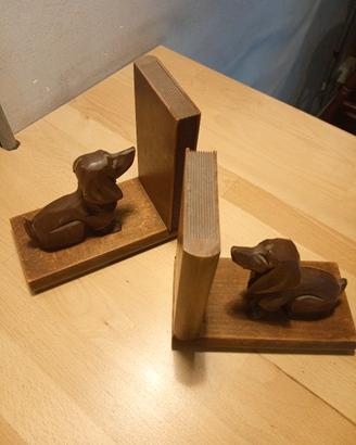 coppia di fermalibri in legno scultura cane