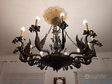 lampadario in bronzo con draghi