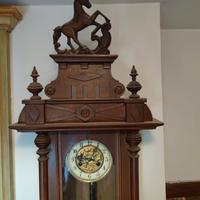 orologio a pendolo con cavallo