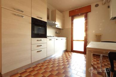 Luminoso bicamere con garage e posto auto