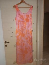 abito lungo con scollo profondo dietro 