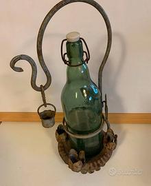 Antico porta bottiglia in ferro