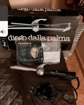 PIASTRA “ ARRICCIACAPELLI “ NUOVA.