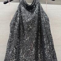 Top  nero che si allaccia al collo con paillettes
