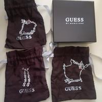 Set gioielli Guess: bracciale, orecchini, collana 