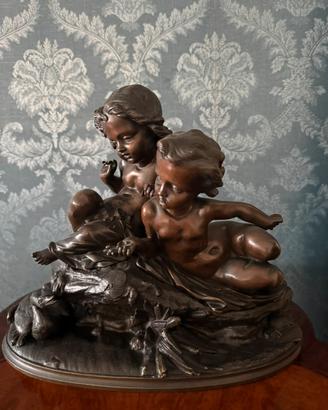 Scultura in bronzo con putti/cherubini