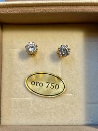 Orecchini punto luce in oro 18k (750) e zirconi