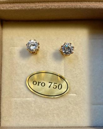 Orecchini punto luce in oro 18k (750) e zirconi