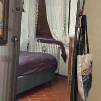 Specchio a terra in ferro battuto