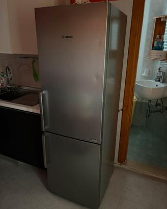 Arredamento camera matrimoniale e elettrodomestici