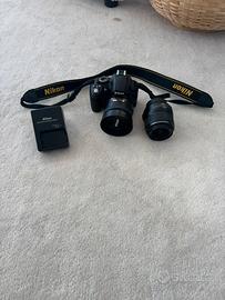 Nikon D3100 + 2 obiettivi (35mm f/1.8 + 18-55mm)