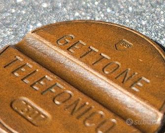 GETTONE TELEFONICO 7307 "ES" marchio incompleto (E