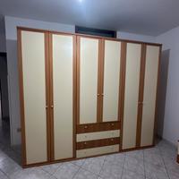 Armadio a 6 ante con cassetti