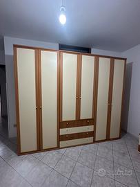 Armadio a 6 ante con cassetti