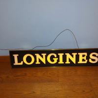 insegna luminosa Longiness