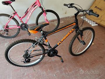 Bicicletta da 20 bimbo nera e arancione 