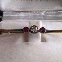 Spilla balia anni 40 con brillante antico e rubini