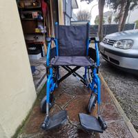 Carrozina per disabili con pedana