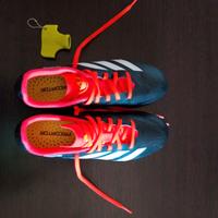 Scarpe da calcio Adidas con tacchetti in ferro