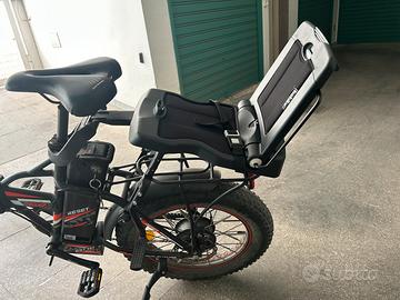 Seggiolino bambini posteriore per bici elettrica