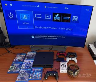 PS4 Slim 500 GB + 4 cont. HDD 2 TB 6 Giochi Cuffie