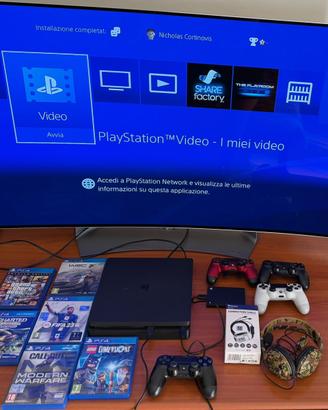 PS4 Slim 500 GB + 4 cont. HDD 2 TB 6 Giochi Cuffie