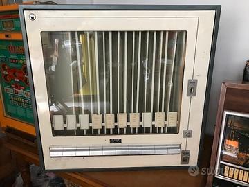 Distributore automatico caramelle sigarette anni60