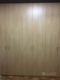 Armadio 6 ante battenti + 3 cassetti