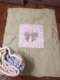 Piumone,paracolpi,trapunta e lenzuolo fatti a mano