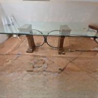 Tavolo in cristallo con base in pietra