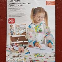 Grembiule e tovaglia plastificati da pittura nuovi