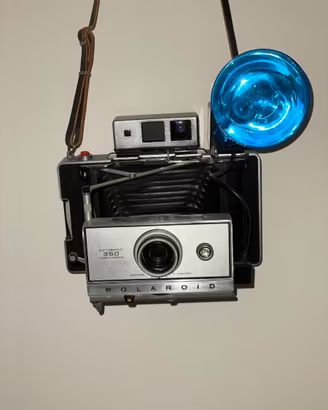 Polaroid Land Camera 350-Pellicola e flash testati