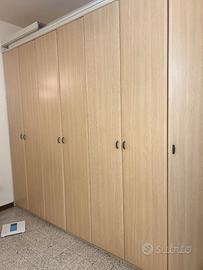 armadio 7 ante con 2 cassettiere interne e ripiani
