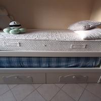 armadio a ponte con letti e cassettoni