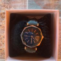 Orologio nero e rose gold