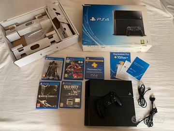 Console PS4 + 4 giochi + controller