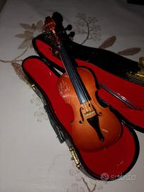 violoncello in miniatura 