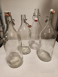 N. 23 bottiglie trasparenti 1 litro tappo gabbia