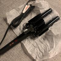 Piastra percapelli triple wave curler