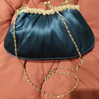 pochette raso blu Luisa spagnoli con gioielli