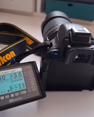 Nikon D5100 + Nikkor 18-140