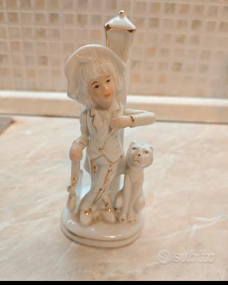 Statuina vintage in porcellana con bambino e gatto